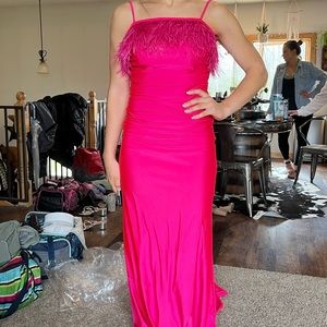 Pink prom dress size 4, feathers detach. $200